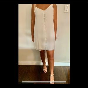 White button shift dress and tie straps